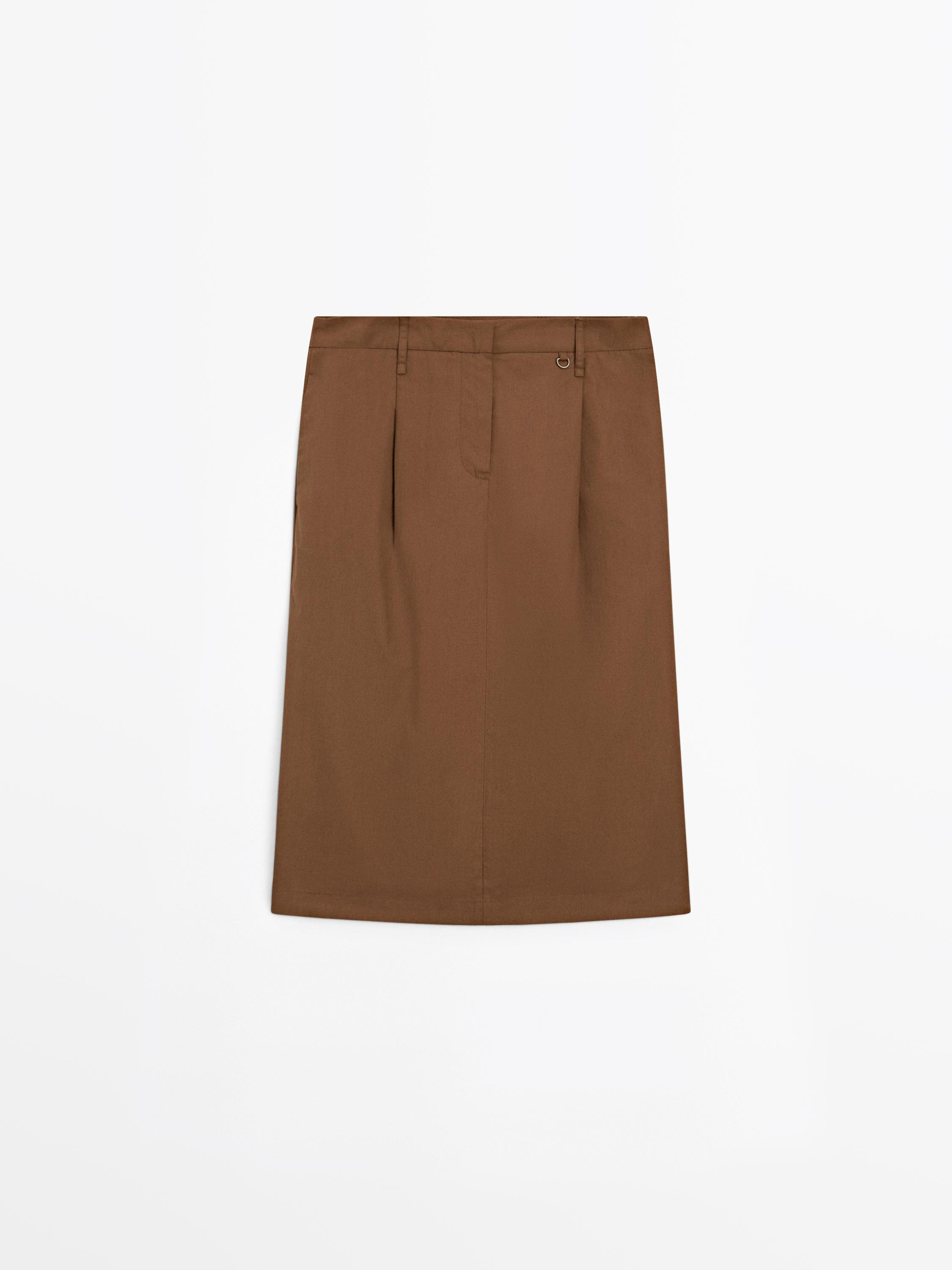 Jupe midi détail à la taille